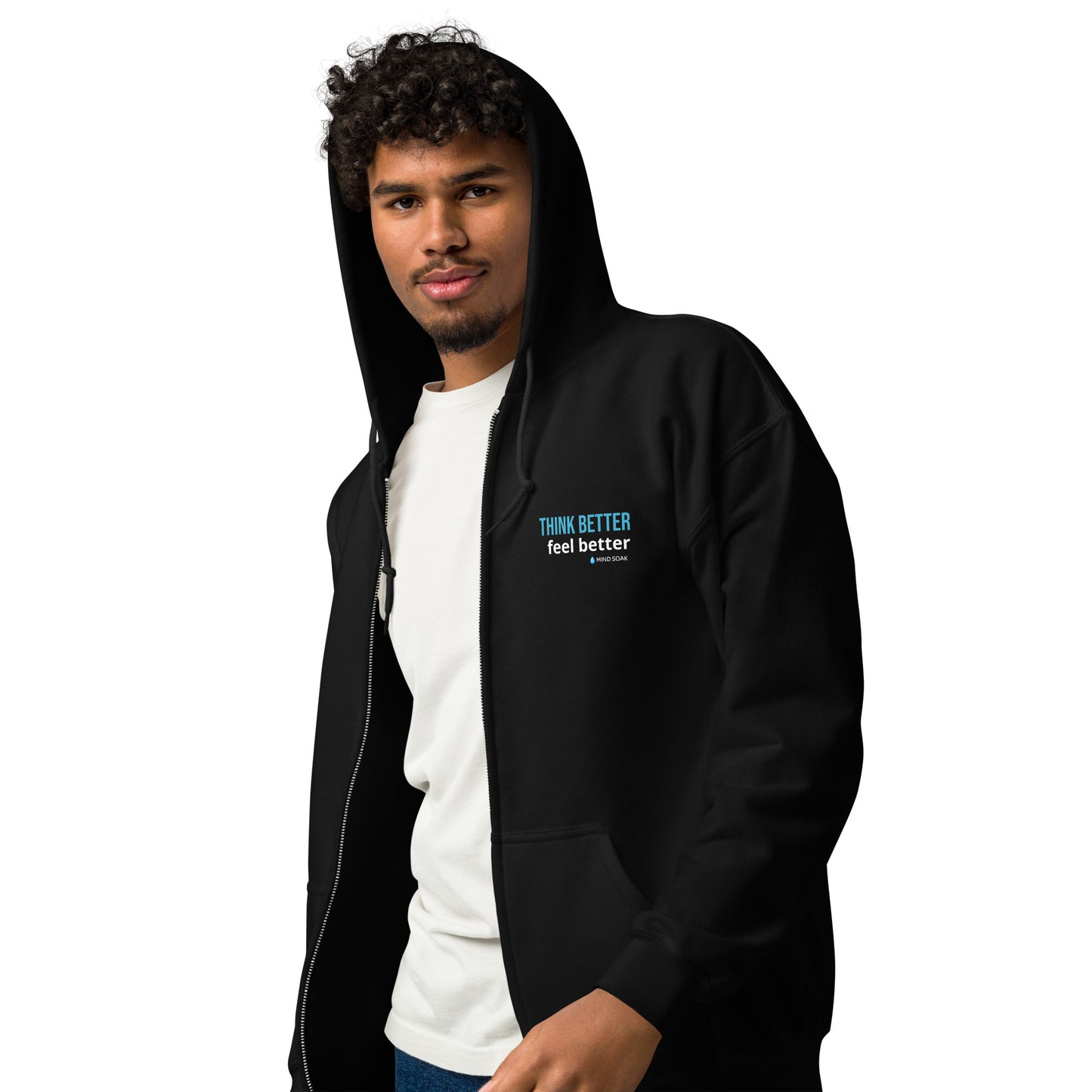 A man with curly hair wears a black zip-up hoodie featuring the blue and white text "THINK BETTER feel better" on the chest.